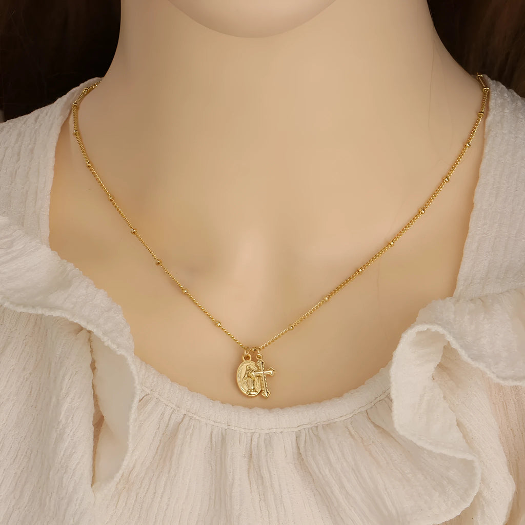 Gold Virgin Mary and cross geometric pendant necklace on a chain