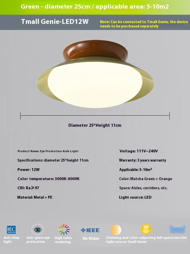 Modern cream-style flying saucer shaped ceiling lamp in a bedroom setting.