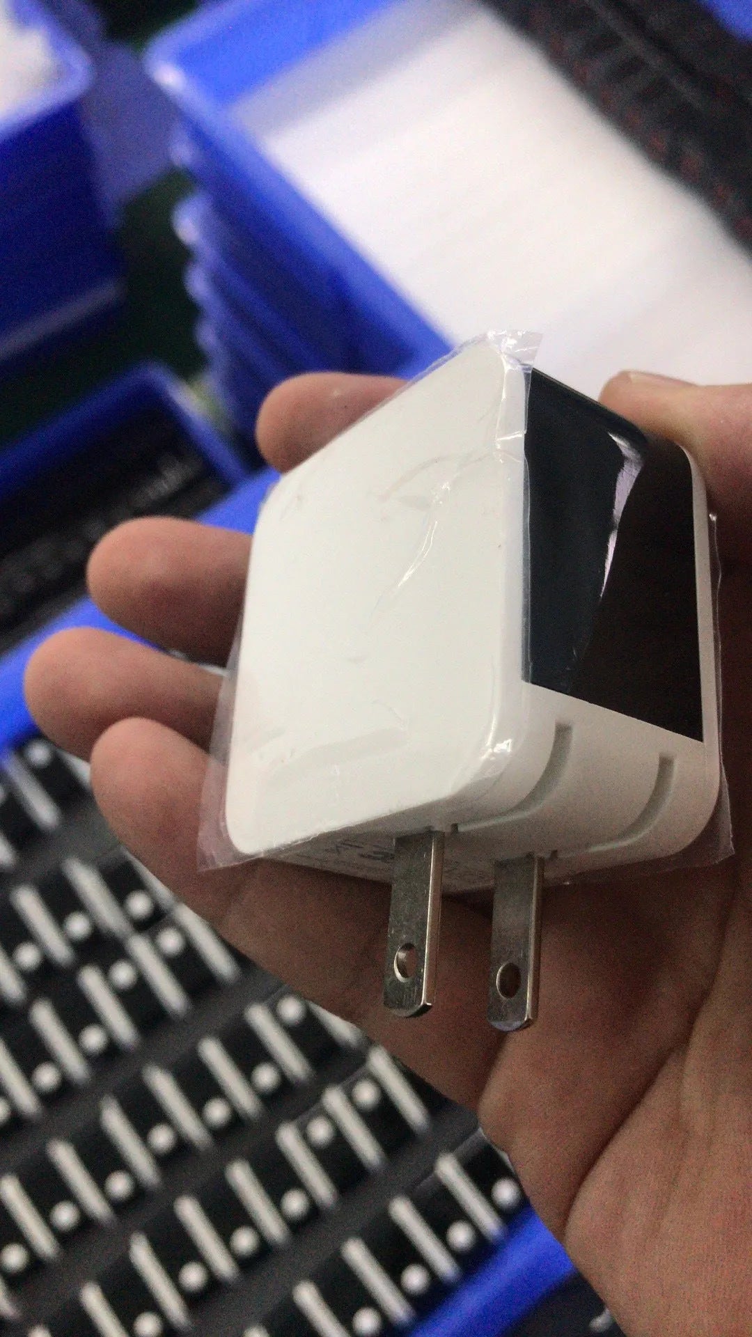 Black 5V2A fast travel charger with dual USB ports and a digital display, shown with a UK plug.