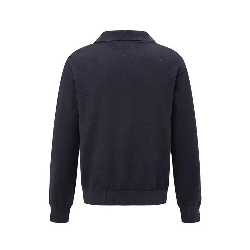 Man wearing a loose beige acrylic blend pullover sweater for casual leisure.