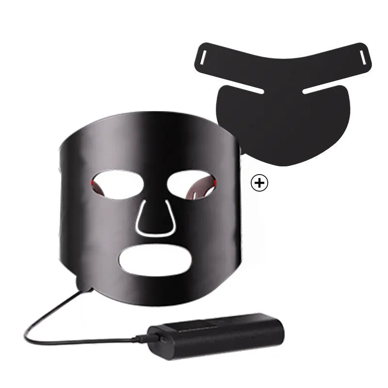 Black and white LED phototherapy face mask with controller for home skin light therapy.
