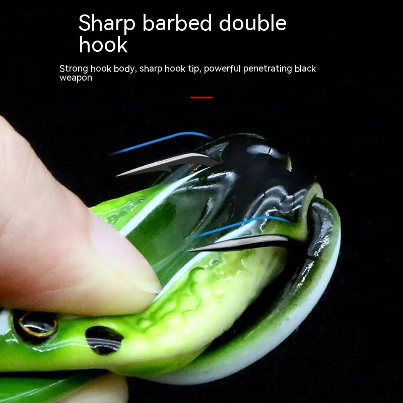 Bionic frog and snake head fishing lure with black thunder frog legs on a double hook