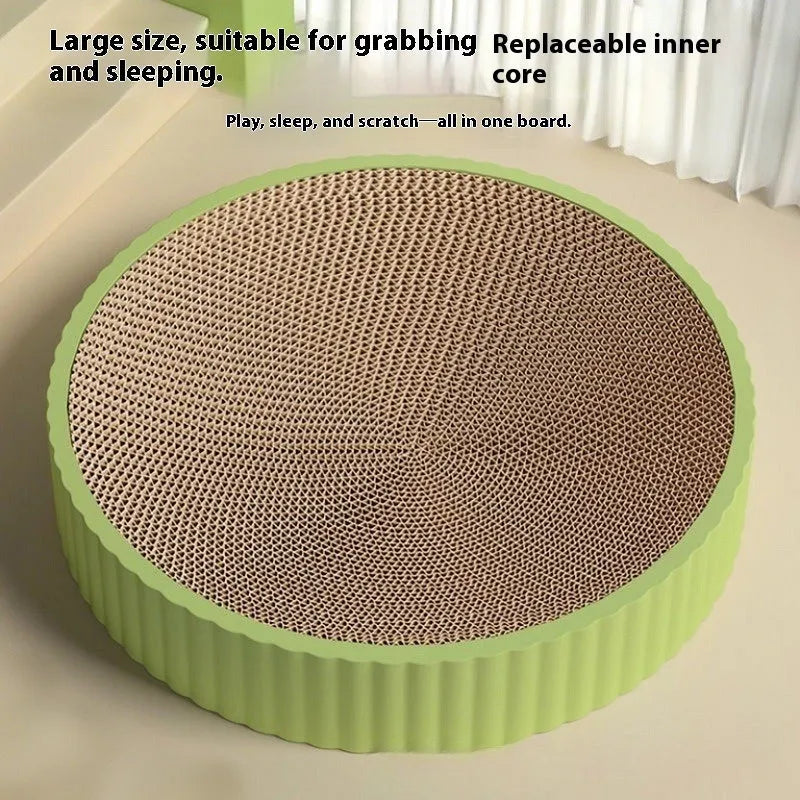 Green round cat scratching board with corrugated paper surface measuring 55 cm diameter