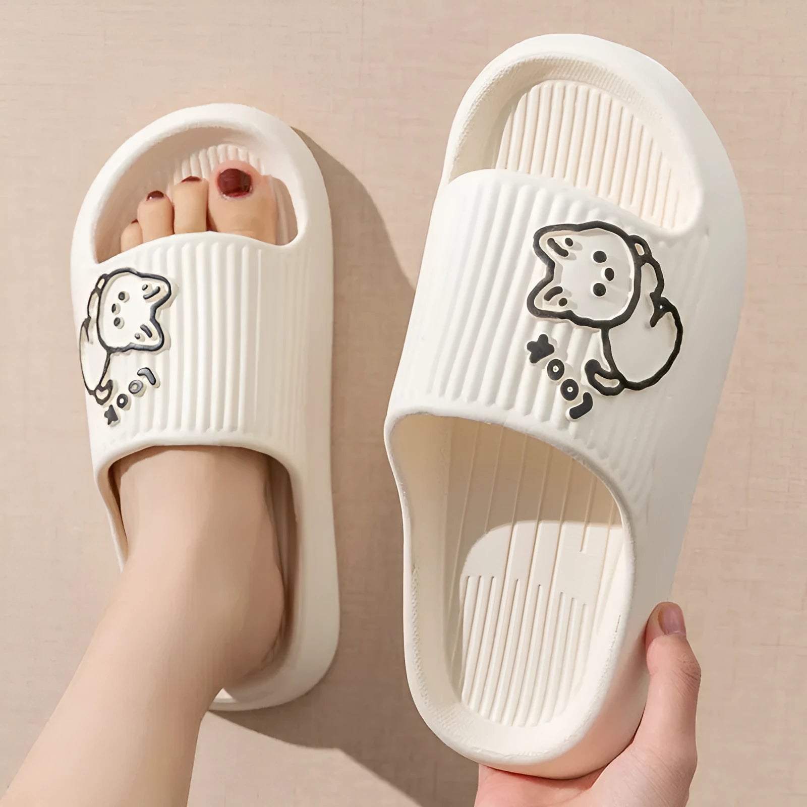Green EVA cat flip-flop slippers with a thick platform sole on a white background.