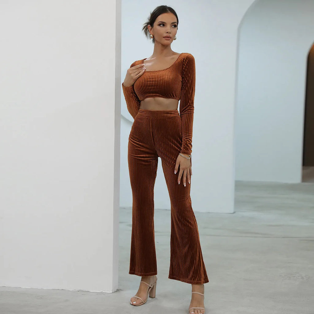 Caramel coloured women's long sleeve sweater and jogger lounge set laid flat.