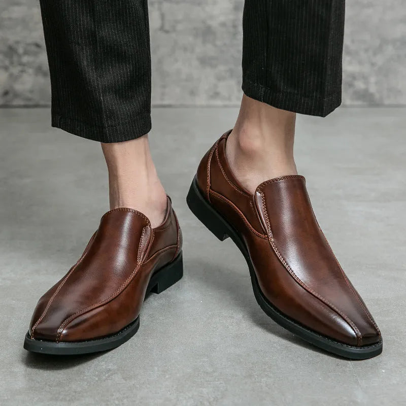 Men's black pointed leather casual shoes with flat rubber sole, shown from side