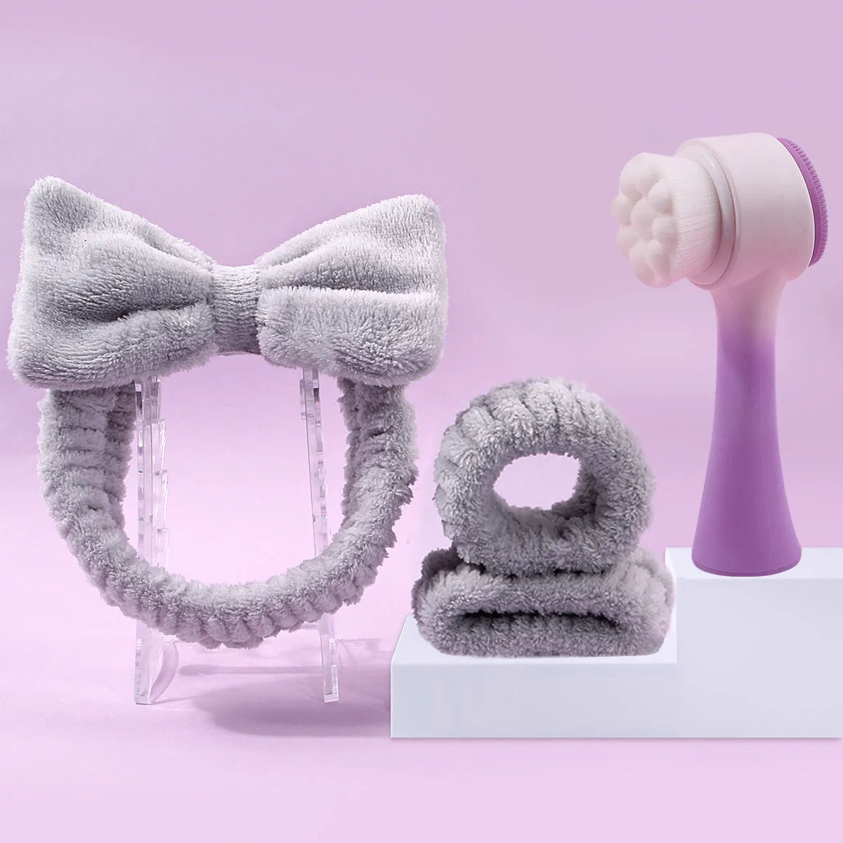 Facial brush set with coral fleece hair band, absorbent headband, and waterproof shower brush in purple colour