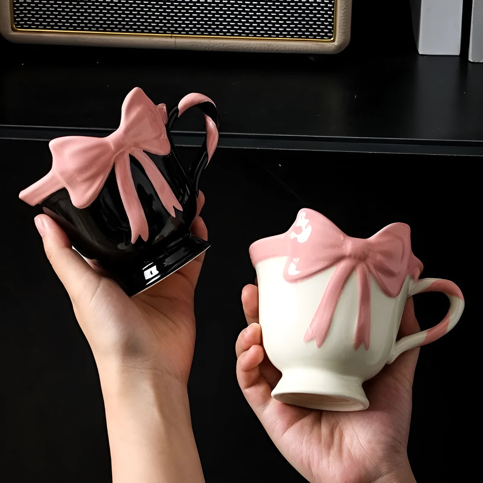 Ceramic mug with bow and heart design in white powder or black pink colours