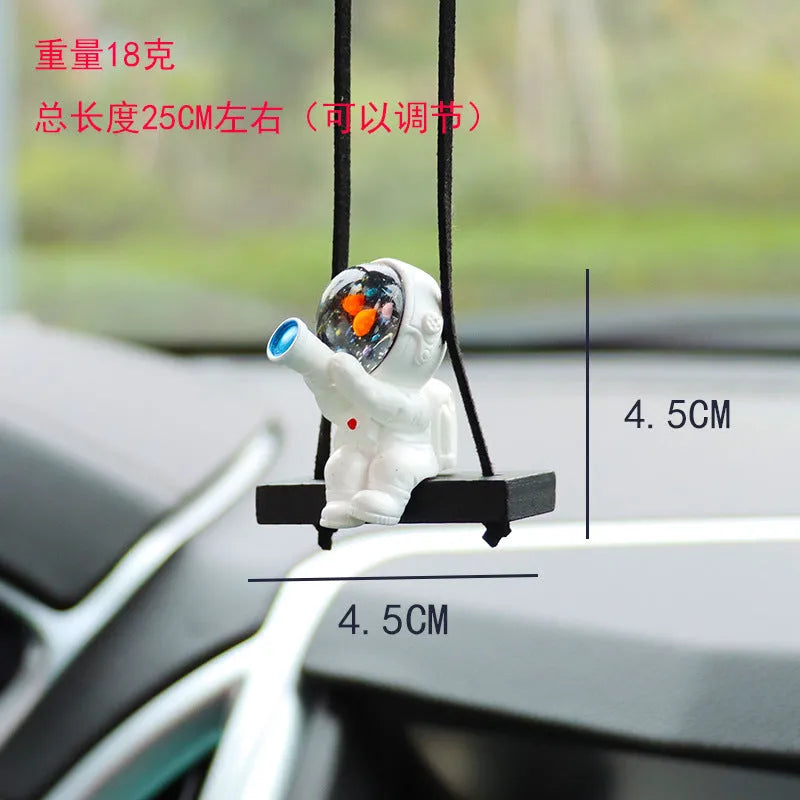 Resin car pendant with cartoon astronaut designs for vehicle interior decoration