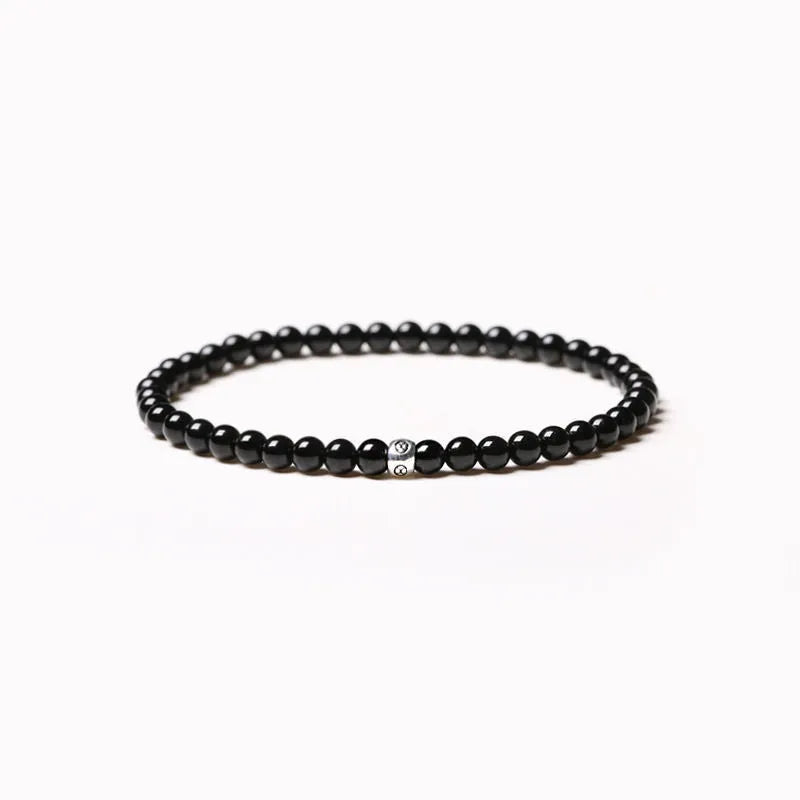 Fine obsidian agate blue San bracelet with geometric chamfered square and round beads