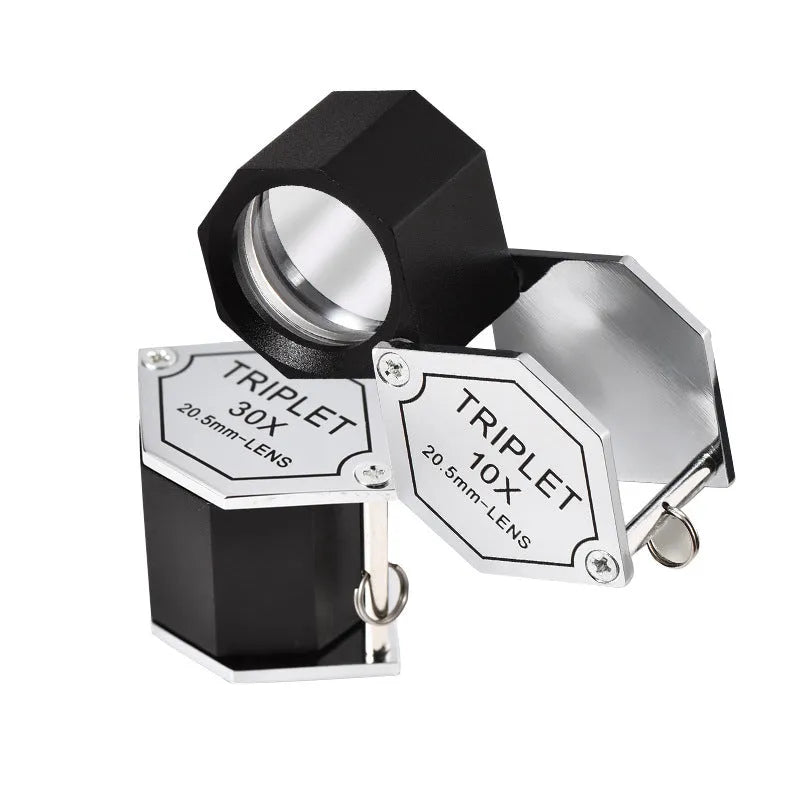 Handheld jeweller's loupe with metal frame and optical glass lenses for 10x to 30x magnification