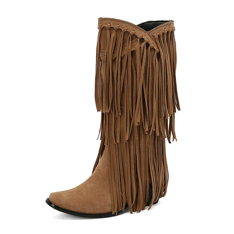 Women's black suede knee-high boots with a chunky heel and tassel decoration.