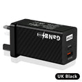 White and black 65W Gallium Nitride USB-PD laptop charger with EU, UK, and US plug options.