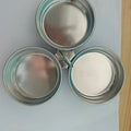 Mini stainless steel egg steamer in heart-shaped design with compact kitchen appliance dimensions
