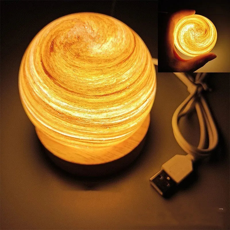 Planet-themed night light with USB cable and base, showing 80mm diameter globe