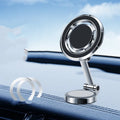 Car mobile phone holder with magnetic clip mount and 360-degree rotating bracket on dashboard