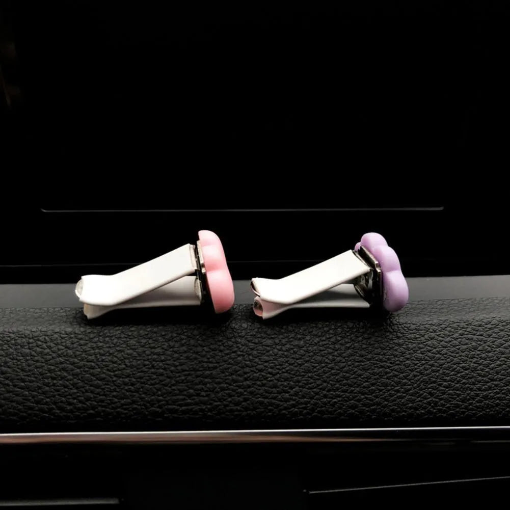Resin car fragrance clip for air vents in one of six colours: sky blue, pink, yellow, light purple, white, or light green