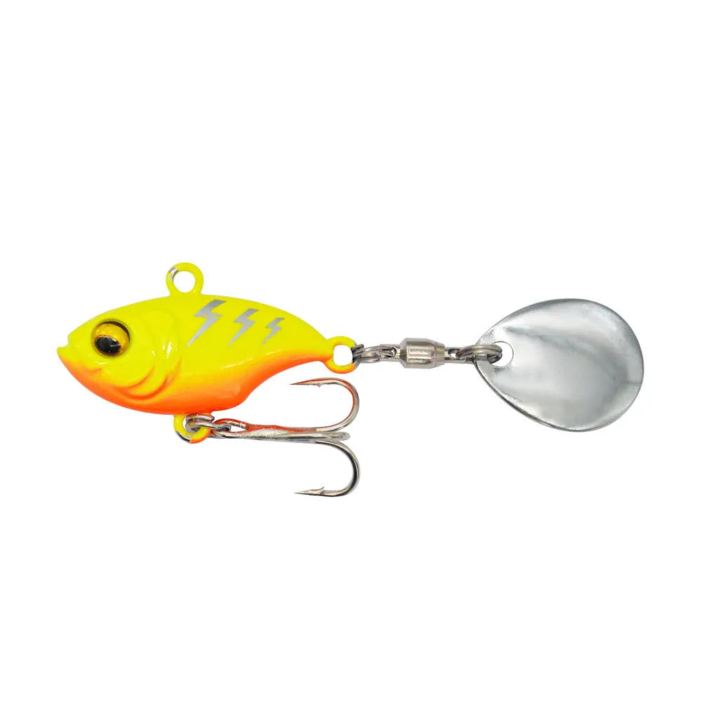 Metal sea fishing lure with rotating sequin in gold colour option