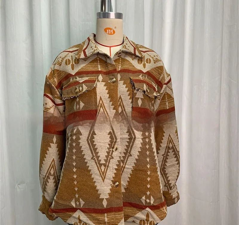 Women's loose-fit retro coat with blue Aztec print and long sleeves.