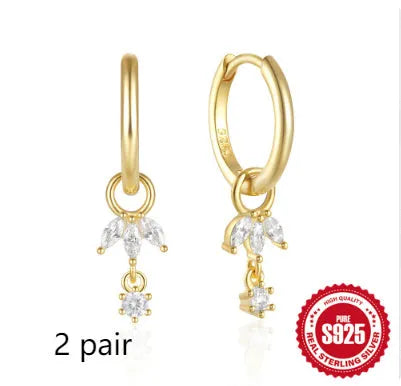 Sterling silver earrings with geometric sunflower design and inlaid zircon stones in golden-three diamond colour