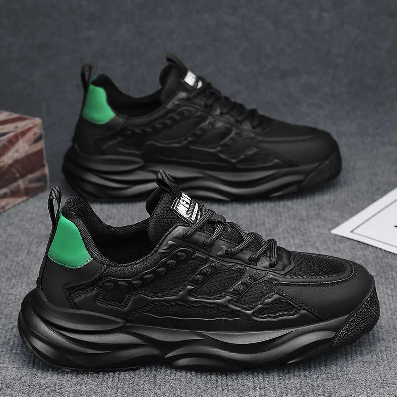 Men's white and black breathable mesh sports shoes with round toe design.