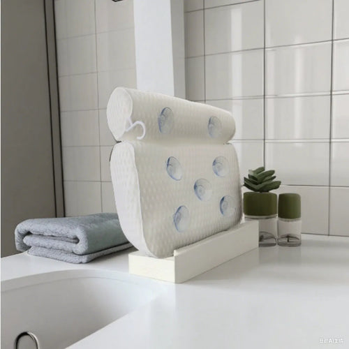 White bathtub pillow with 4D mesh surface and 7 suction cups on back