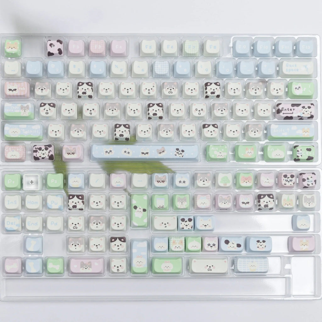 PBT sublimation key cap set showing colourful cat and puppy character designs on mechanical keyboard keys