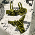 Women's green 3D flower swimsuit with matching bra and briefs on mannequin