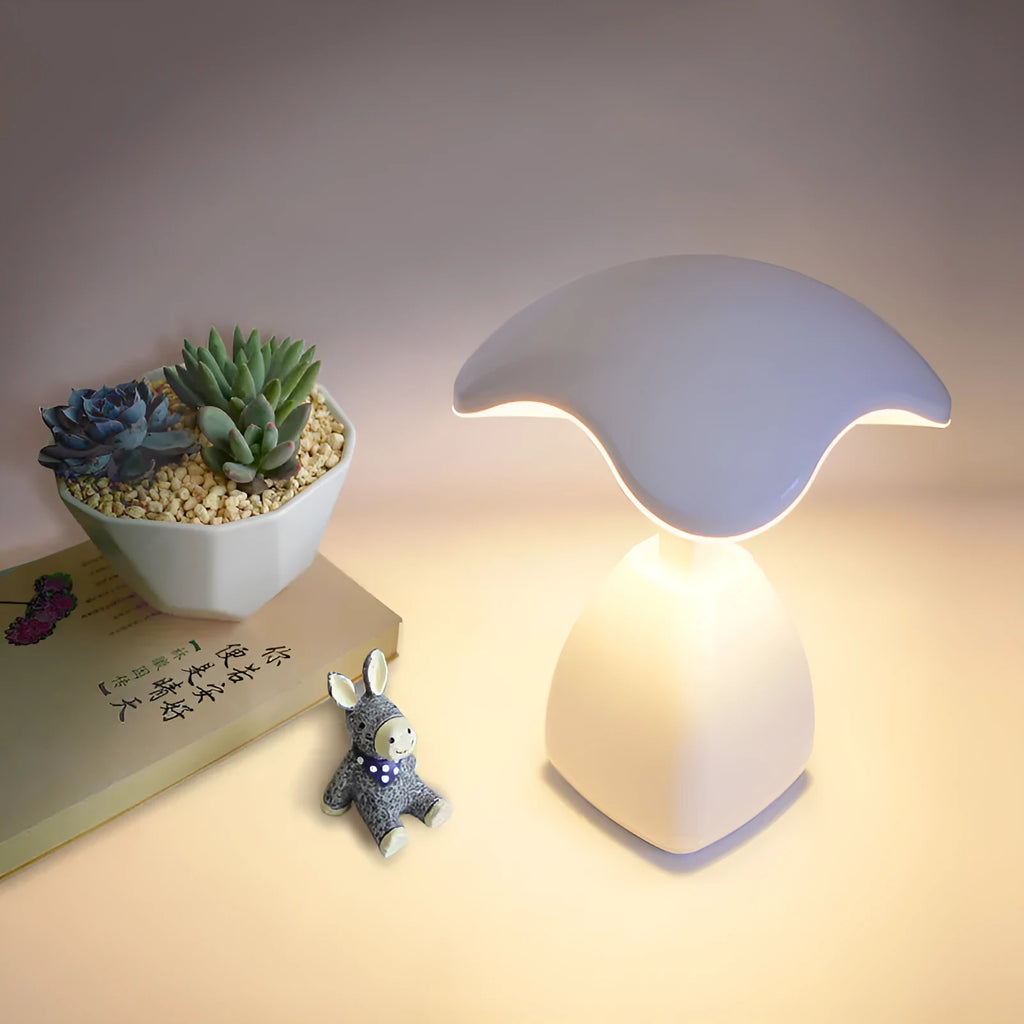 White modern LED desk lamp with plastic shade and touch controls for bedside or desk use