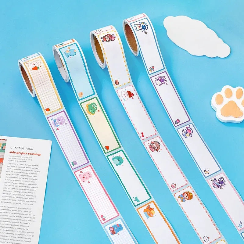 Roll of cartoon adhesive name tape stickers showing Dinosaur, Astronaut, Rabbit, and Girl designs.