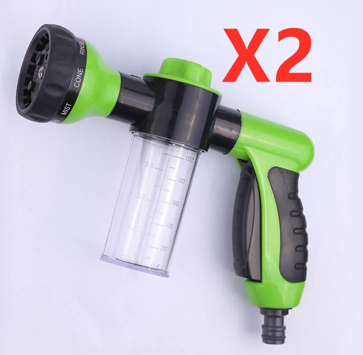 Green high-pressure foam spray water gun with adjustable nozzle for car and garden cleaning.