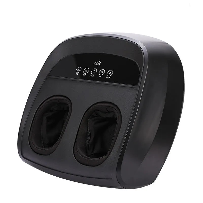 Flip automatic foot massager in black on a floor, showing foot placement area.