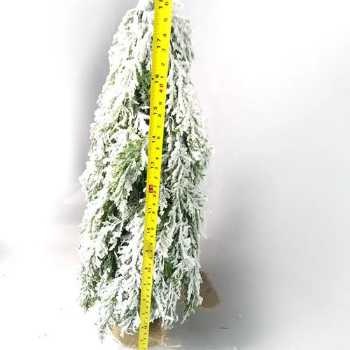 24-inch artificial Christmas tree with white snow finish and built-in LED lights on branches