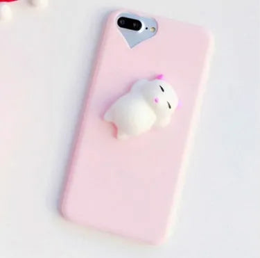 Soft silicone TPU iPhone case with a raised 3D cartoon cat design, shown in various colours.
