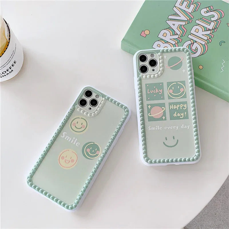 Green TPU iPhone case featuring a geometric smiley face and polka dot frame design.