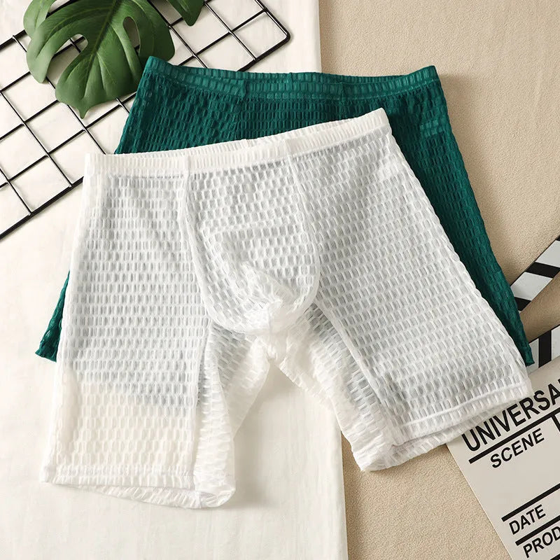 Men's solid colour lace boxer briefs with a lengthened hip-lifting design on a white background.