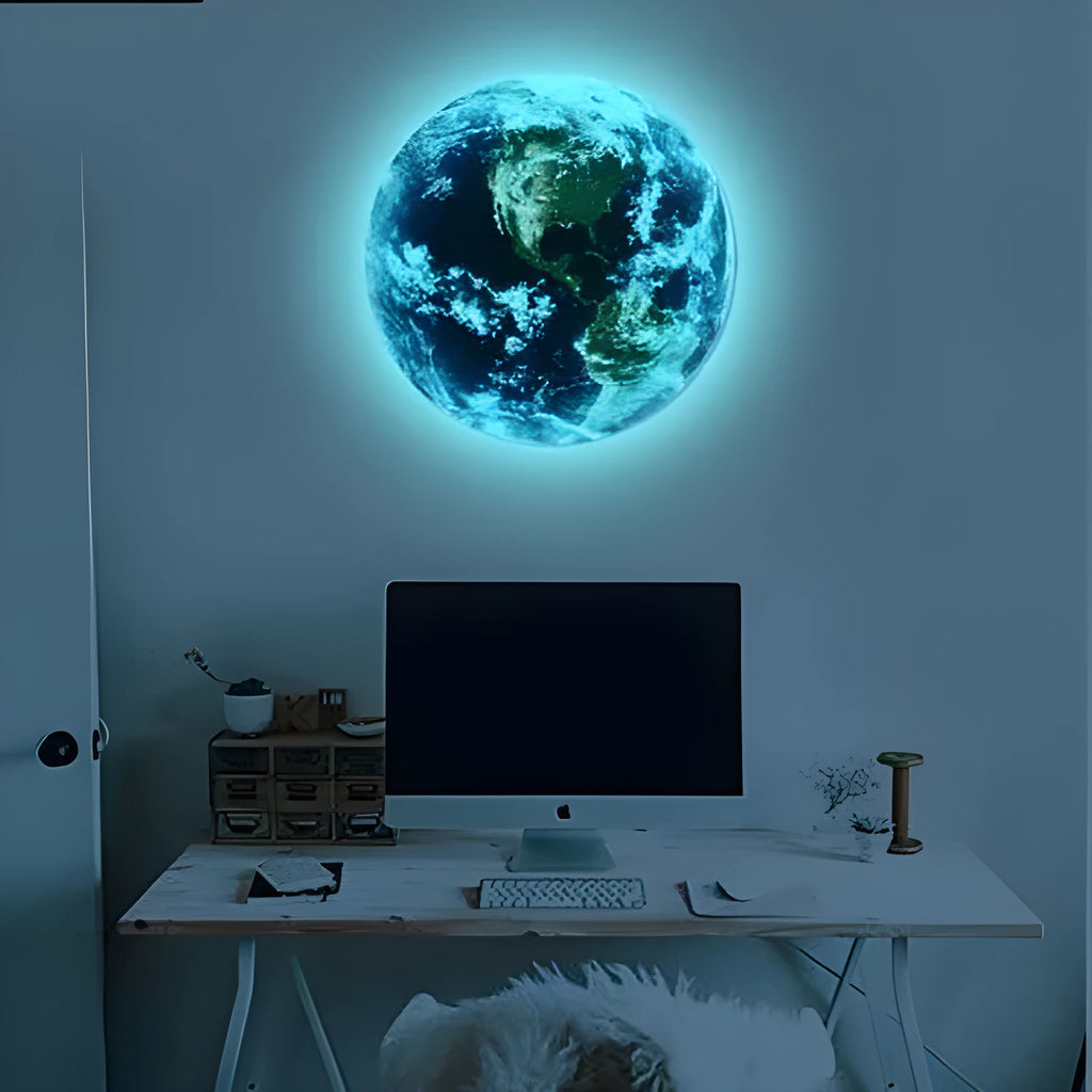 Glow in the dark 3D Earth planet wall sticker in luminous PVC material on a dark background.