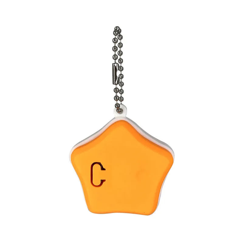 Blue rechargeable pet pendant light showing 6.3cm silicone construction for dog walking safety