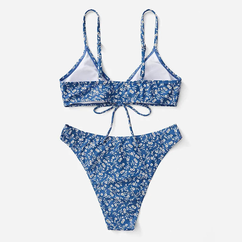 Blue polyester three-piece swimsuit set with separate top and shorts