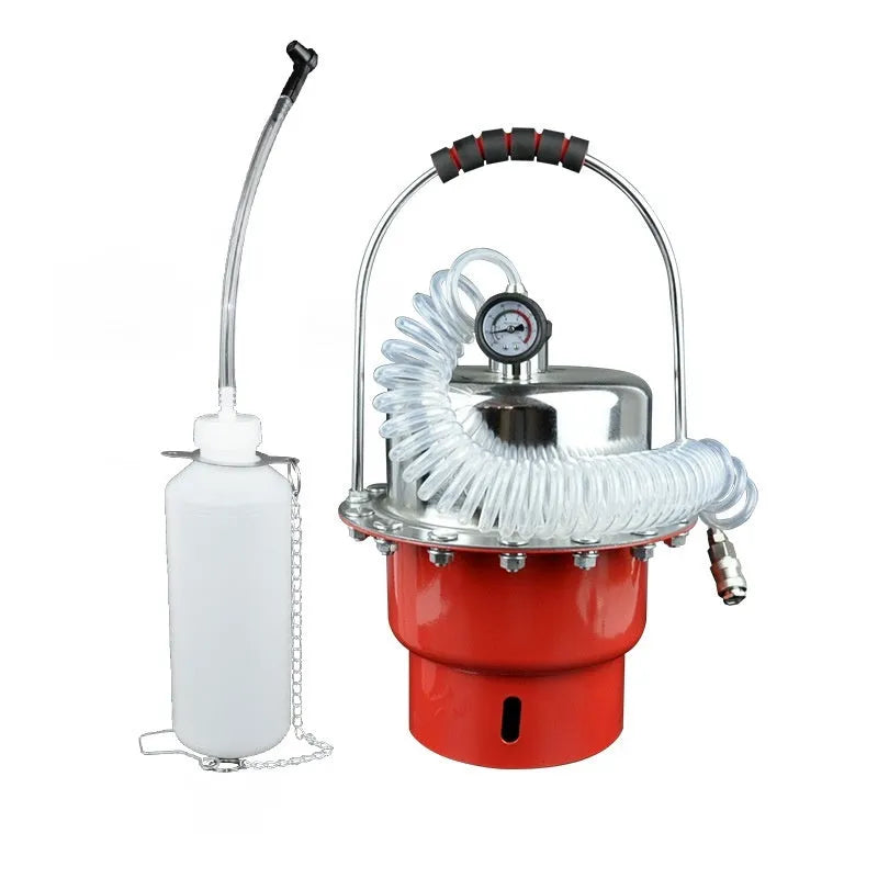 Pneumatic brake fluid bleeding machine with pressure gauge, regulator, and clear drain hose on a workshop bench