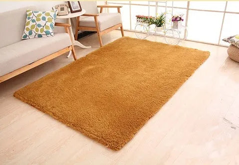 White plush rectangular area rug with a dotted non-slip bottom, shown at 40cm x 40cm size.