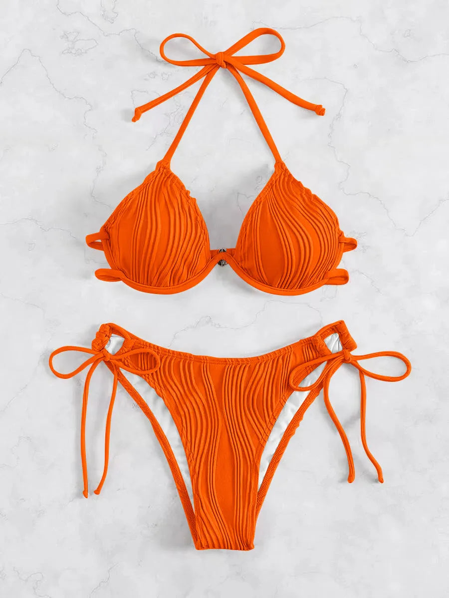 Women's apricot coloured bikini swimsuit with steel underwire bracket on a mannequin.