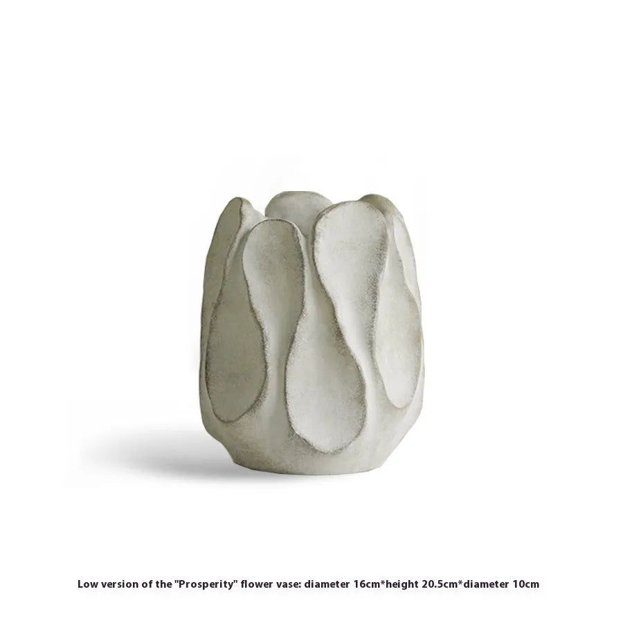 Irregular ceramic vase for flower arrangements in handcrafted design