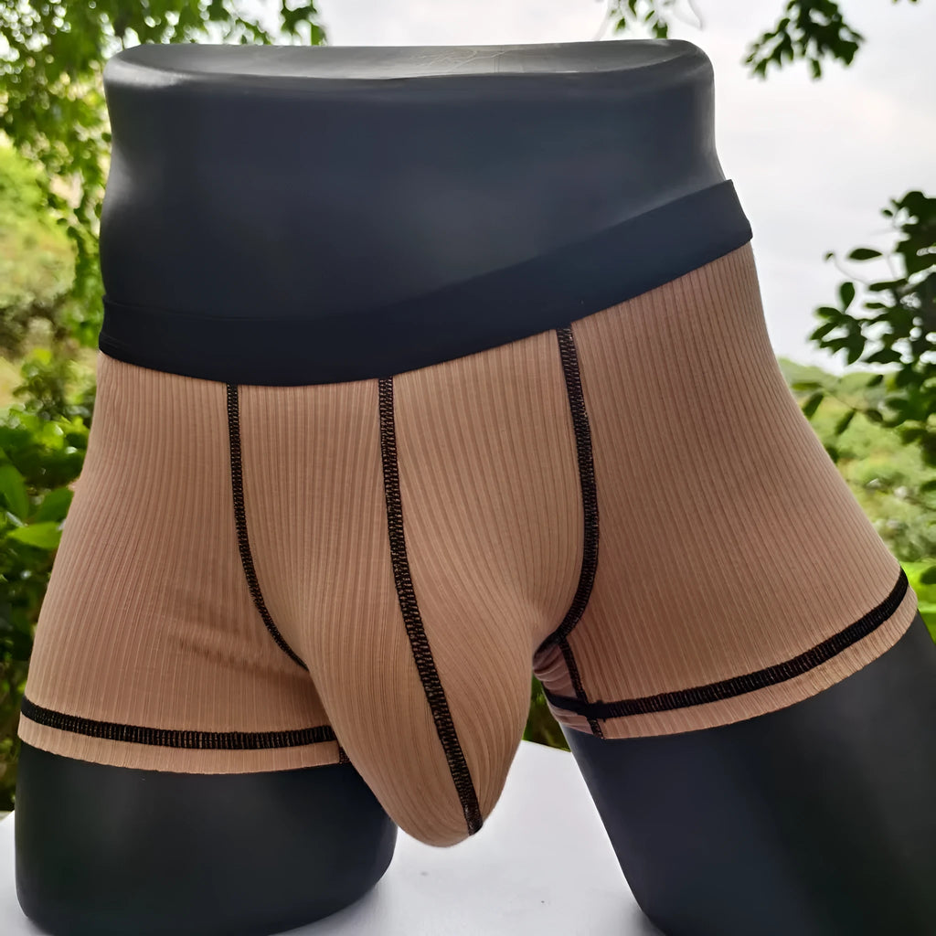 Solid colour men's boxer shorts in breathable fibre fabric, shown in Army Green.