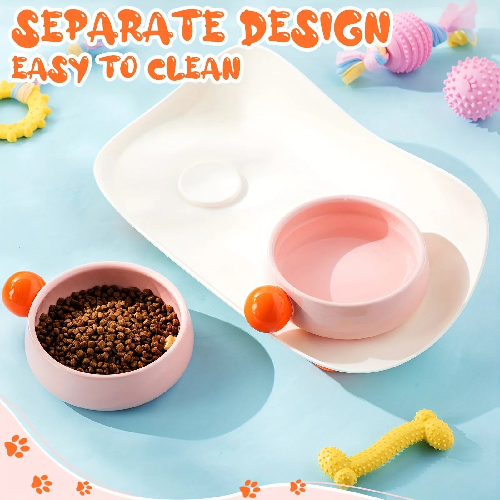 A pink ceramic raised pet bowl with two compartments and a non-slip black rubber base.