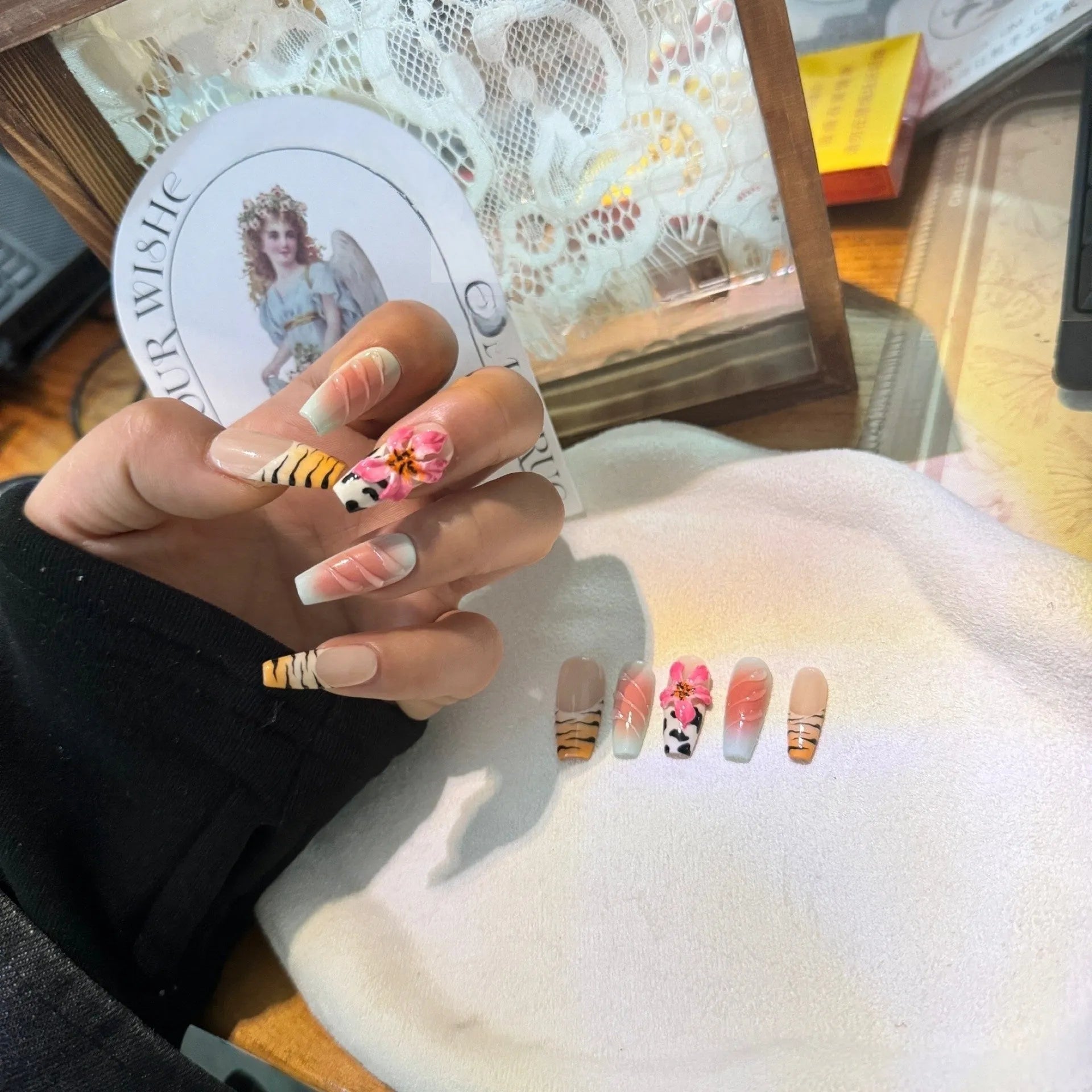 Hand-carved zebra pattern and lily floral nail art set with embossed leopard print.