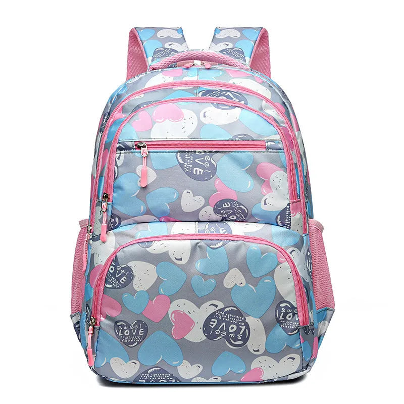 Blue children's school backpack with air pillow shoulder belts and large capacity storage compartments