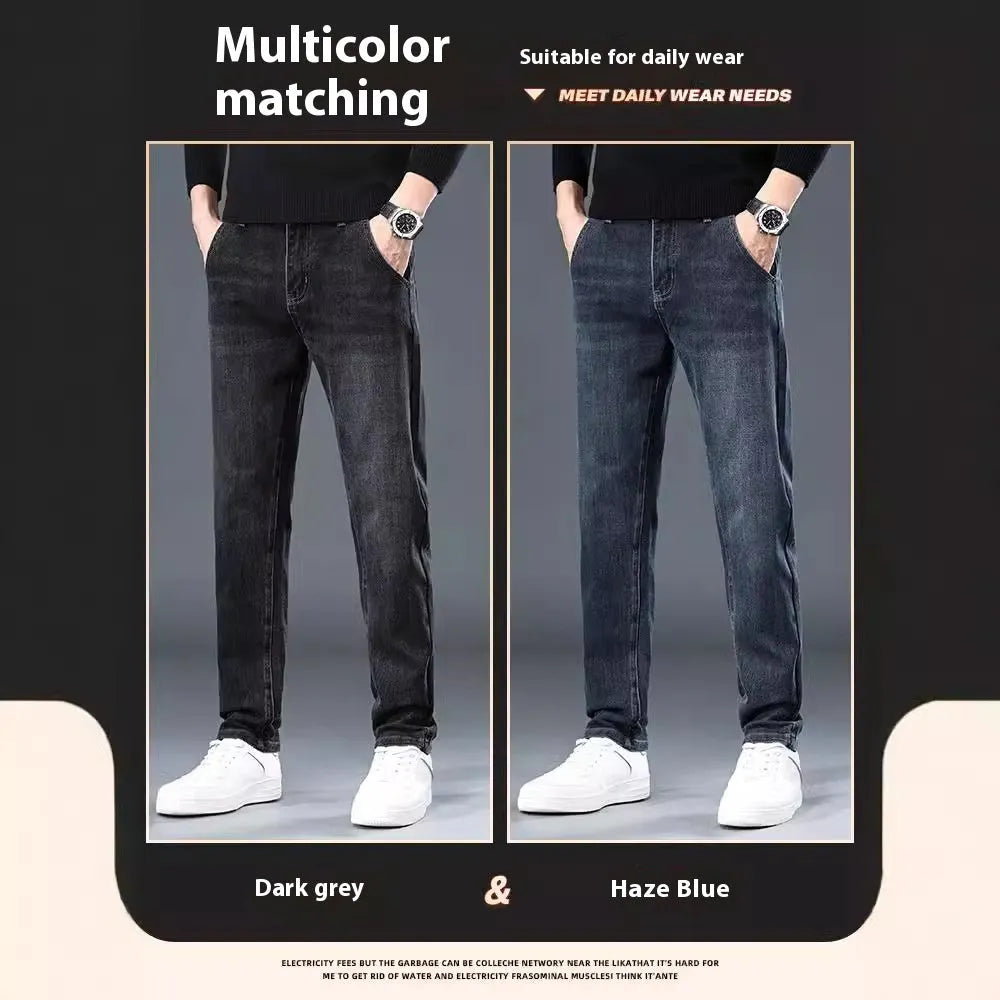 Man wearing slim straight blue grey casual trousers with a loose thin fit and zip fly.