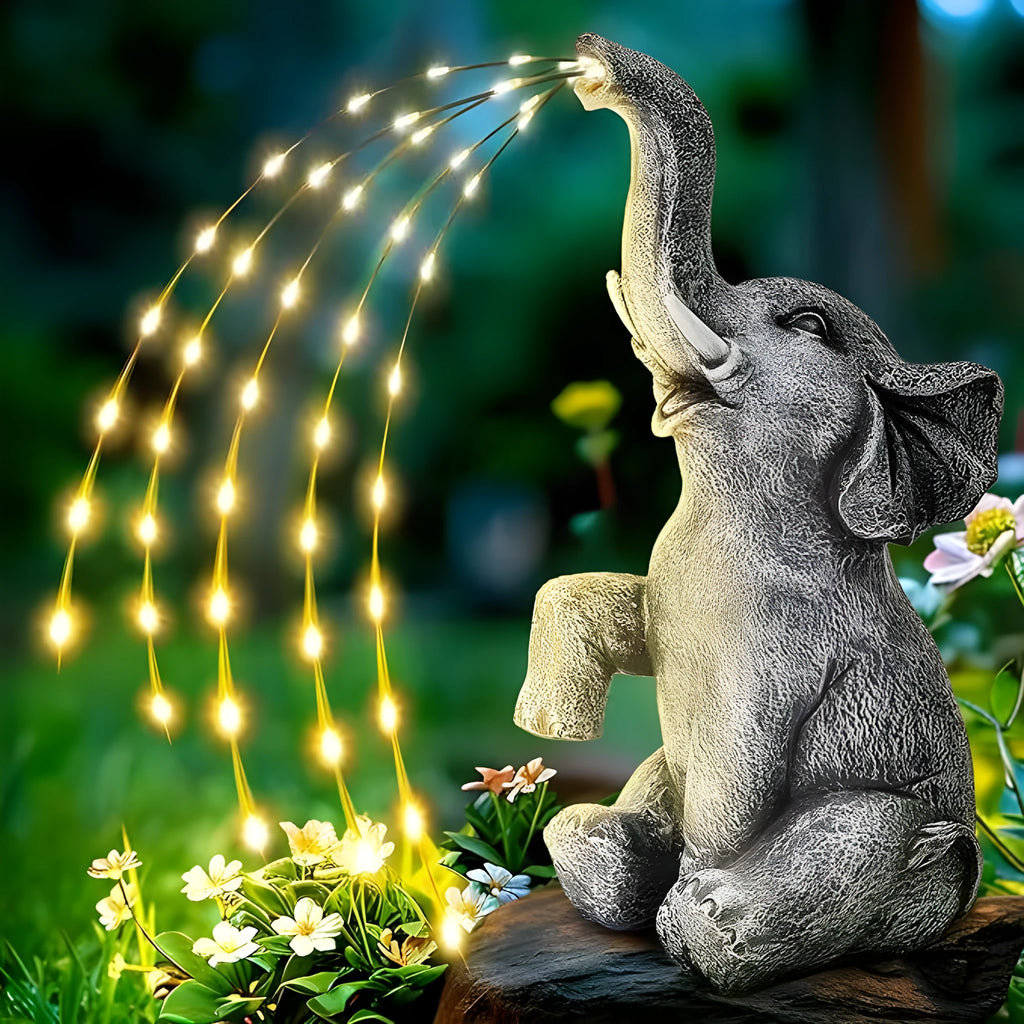 Resin elephant garden sculpture with LED lights for outdoor decoration.