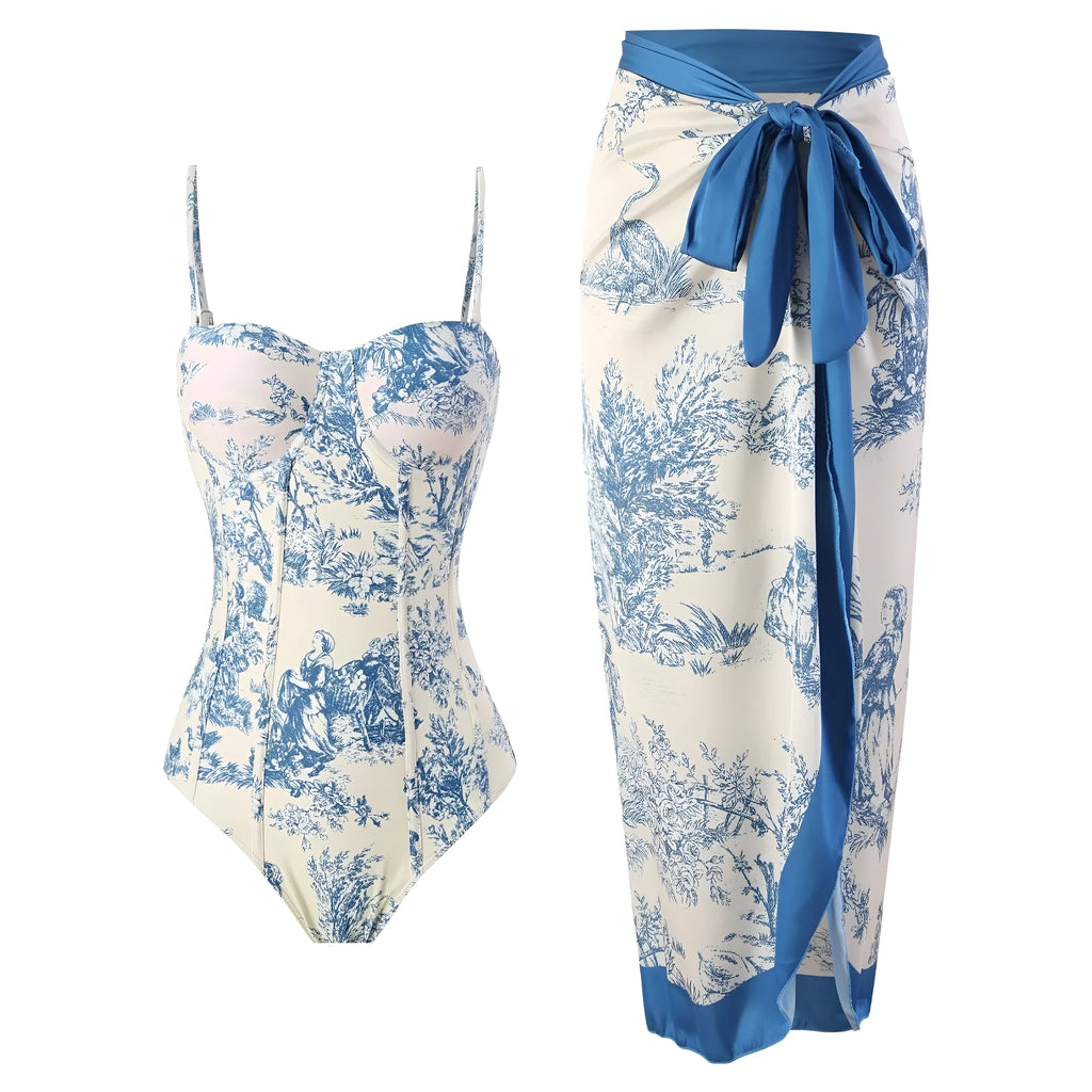 Blue patterned one-piece swimsuit for women shown with an optional matching gauze skirt.